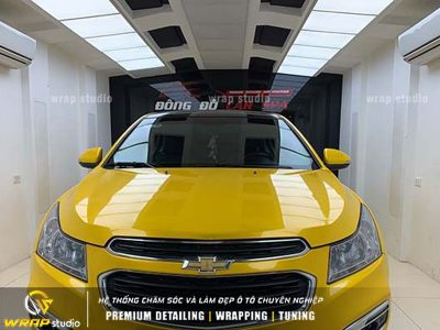 Dán xe chevrolet cruze vàng bóng