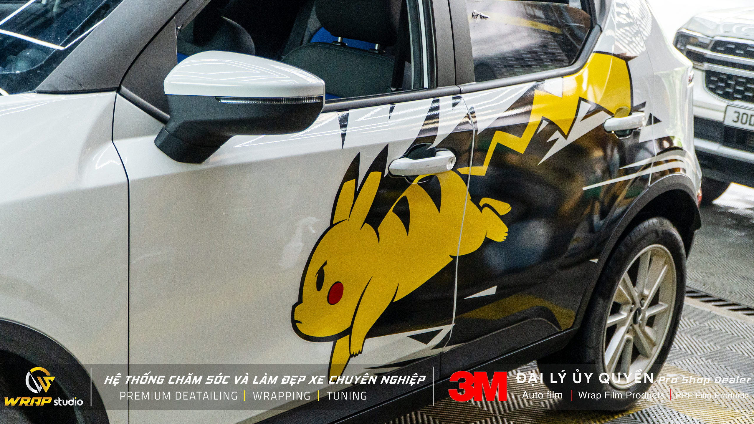 VF5 dán tem Pikachu tại Wrap Studio